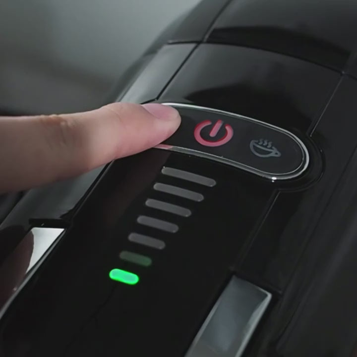 Machine à café à capsules avec adaptateurs